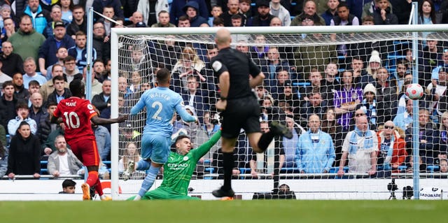 Manchester City retain slender lead after thrilling draw with rivals Liverpool