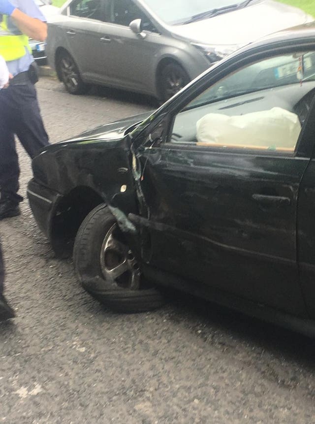 Damage caused to a car after it collided with parked cars near the cemetery