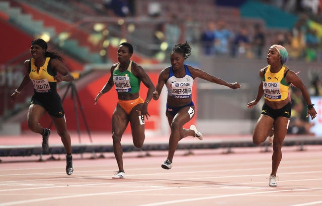 Shelly-Ann Fraser-Pryce, far right, came out on top as Asher-Smith, second right, became the first British female sprinter to claim a world medal 