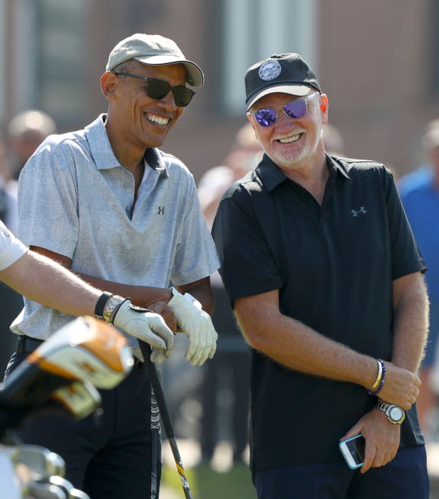 Former US President Barack Obama with Sir Tom Hunter during a round of golf on the Old Course at St Andrews (Andrew Milligan/PA)