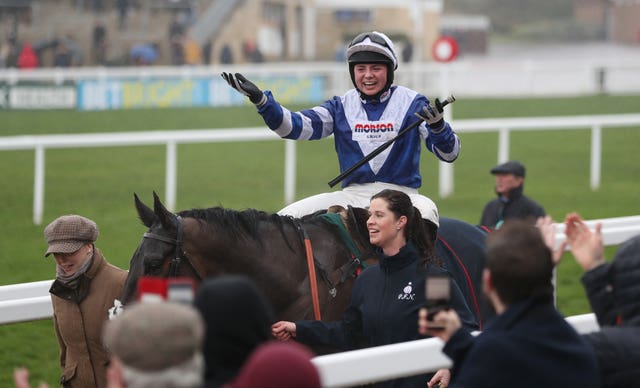 Bryony Frost toasts the crowd after victory on Frodon on the Cotswold Chase