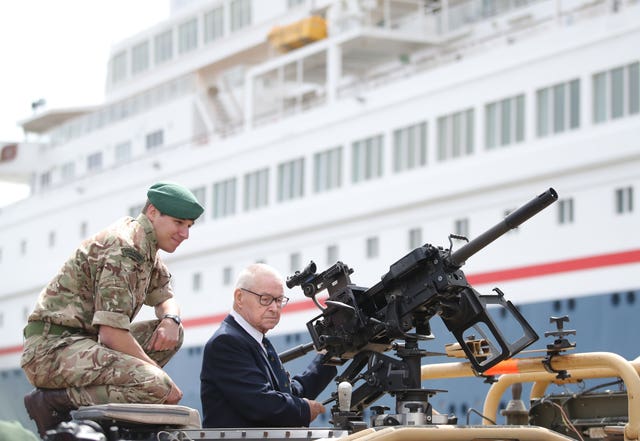 Eric Carter, 94, gets to grips with a Royal Marine Jackal vehicle