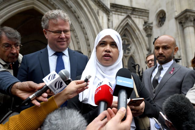 Shelina Begum and Mohammed Raqeeb (right) outside the Royal Courts of Justice in London