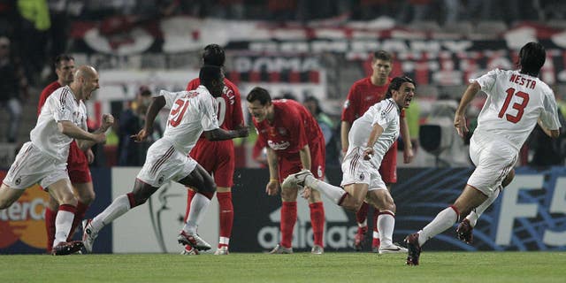 AC Milan’s Paolo Maldini celebrates with team-mates after scoring against Liverpool in the 2005 Champions League final