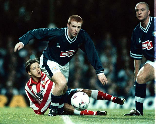 Lennon, centre, is a former player at Leicester and won two League Cups during his spell at the club