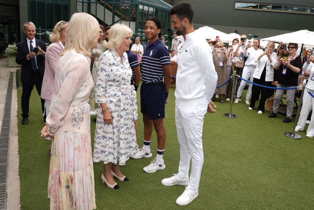 The Queen speaks to Novak Djokovic at the All England Lawn Tennis and Croquet Club on day 10 of the 2025 Wimbledon Championships