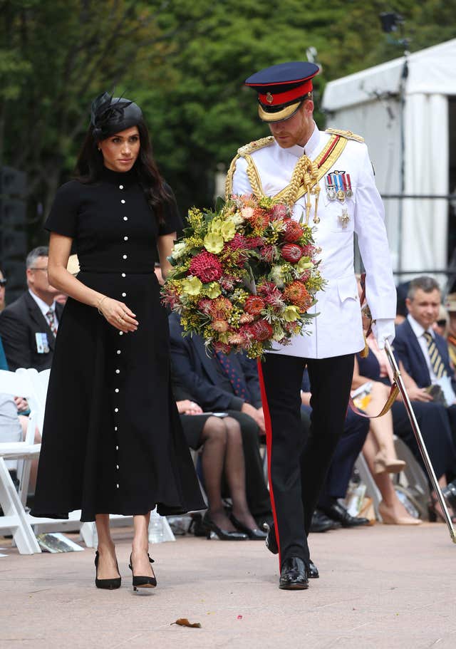 Harry and Meghan laid a wreath during the ceremony at Sydney's 