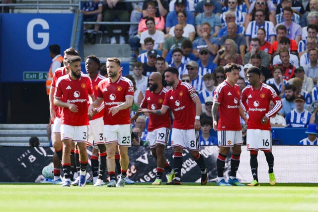 Bruno Fernandes, centre, and Manchester United celebrate Patrick Dorgu's goal