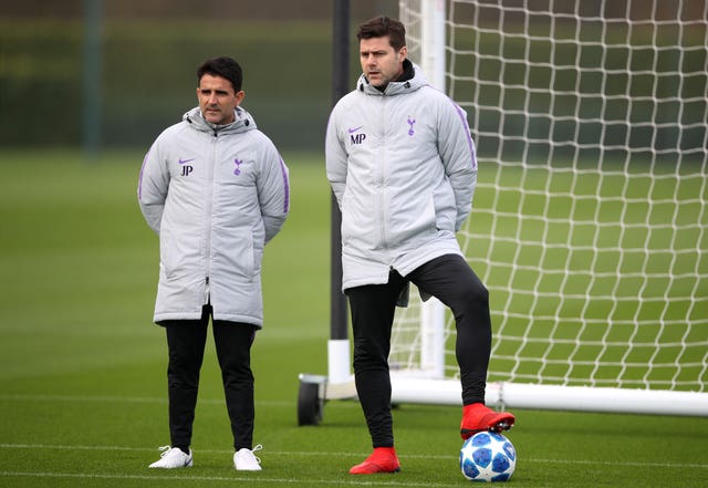 Pochettino (right) believes training in England should be kept private.