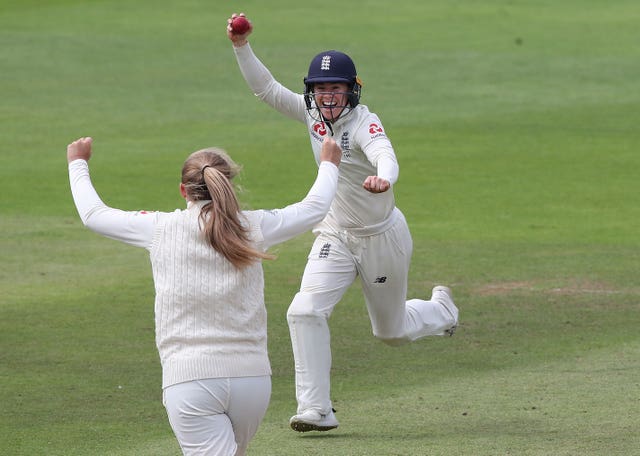 England's Tammy Beaumont celebrates taking the catch of Beth Mooney but Australia retained the Ashes