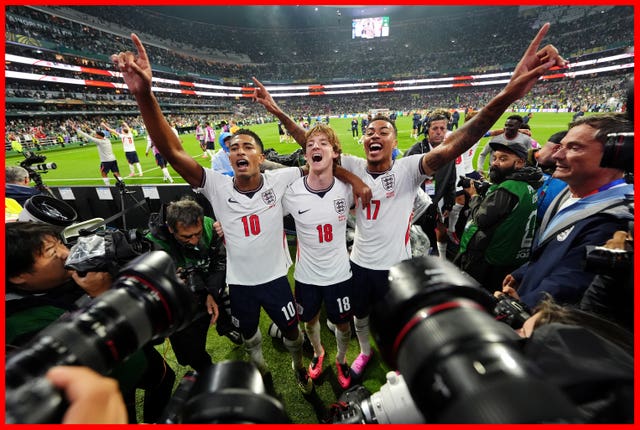 Anthony Gordon (middle) celebrates with Jude Bellingham (left) and Morgan Rogers (right) in Mexico