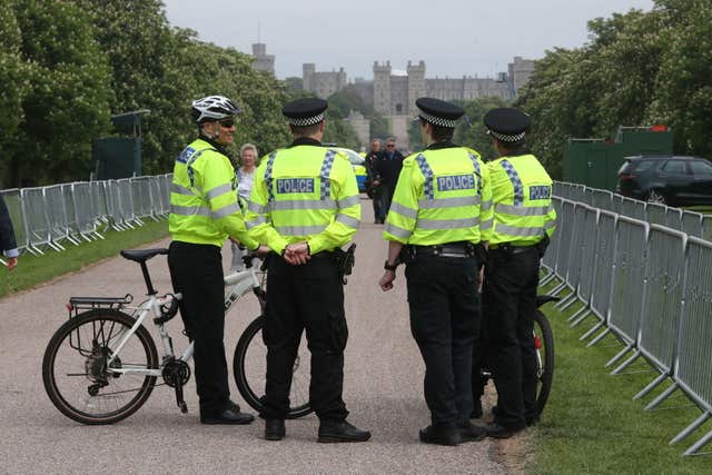 Police officers outside Windsor Castle (Jonathan Brady/PA)
