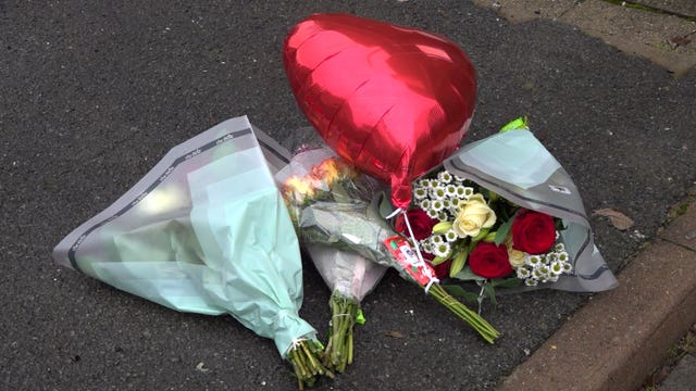 Tributes left at murder scene