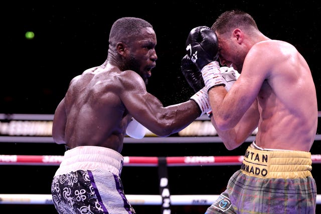 Ekow Essuman (left) in punches Josh Taylor