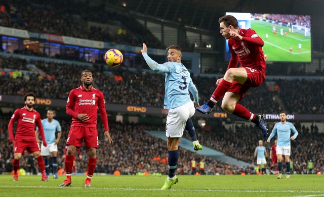 Robertson, right, assisted Liverpool's equaliser but it proved not enough