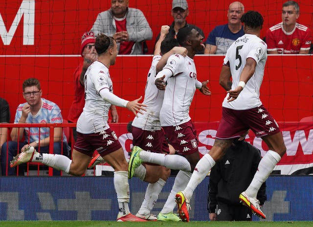 Kortney Hause (second right) celebrates his goal