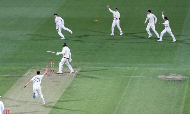 Sam Billings celebrates his catch to dismiss Usman Khawaja