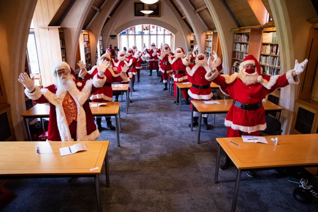 Santas at The Ministry of Fun’s Summer School at Southwark Cathedral, London which aims to create COVID-safe Christmas grottos by teaching Father Christmases how to appear safely in person whilst maintaining the Christmas magic
