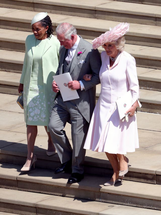 Doria Ragland, the Prince of Wales and the Duchess of Cornwall leave St George’s Chapel in Windsor Castle (Andrew Matthews/PA)