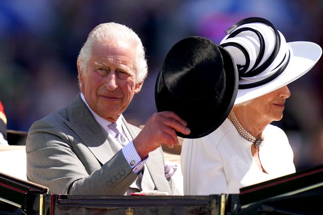 The King and Queen arrive by carriage during day four of Royal Ascot at Ascot Racecourse, Berkshire