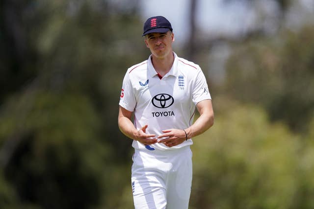 England Lions’ Matt Fisher stands in the field