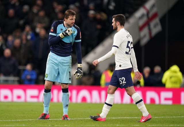 Tim Krul, left, admitted to playing with Troy Parrott's mind ahead of his penalty