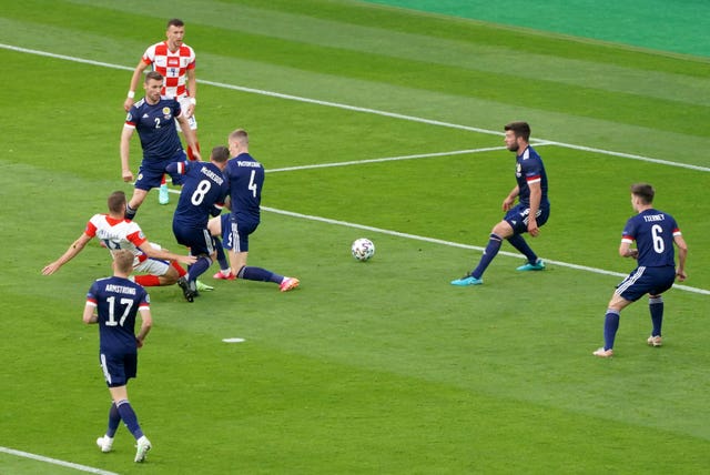 Nikola Vlasic, left, scores Croatia’s first goal