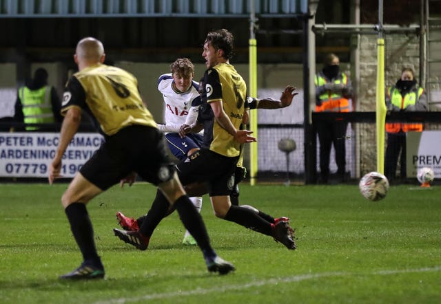 But Spurs went on to win 5-0 with youngster Alfie Devine, right, grabbing a debut goal