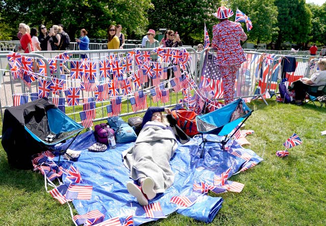 Camping out: Fans make sure they get the best spot to view the Big Day (Owen Humphreys/PA)