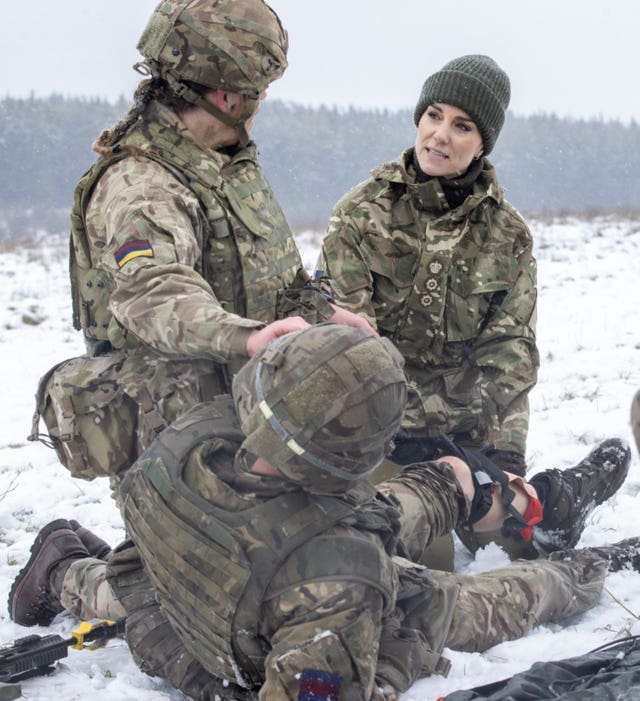 The Princess of Wales is shown how to carry out battlefield casualty drills