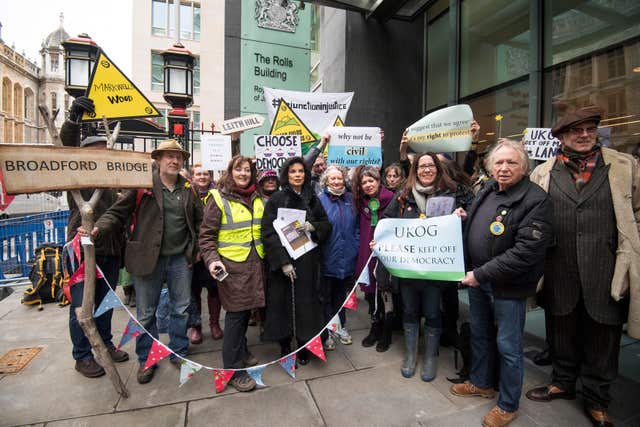 Bianca Jagger joins protesters outside the Rolls building in London against UKOG, an oil and gas company which is attempting to bring an injunction against campaigners at four oil drilling sites in Surrey and Sussex (Victoria Jones/PA)