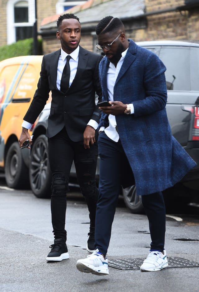 Stoke City forward Saido Berahino,left, arriving at Highbury Corner Magistrates’ Court