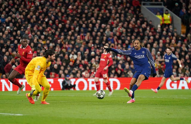 Paris St Germain’s Bradley Barcola misses a chance against Liverpool's Alisson Becker