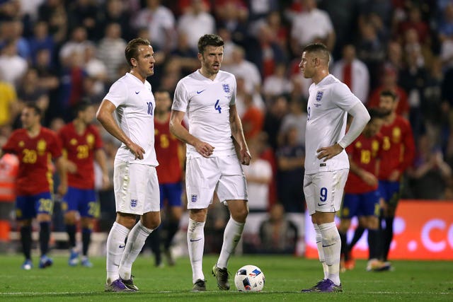 Michael Carrick (centre) made his 34th and final England appearance in the same match.