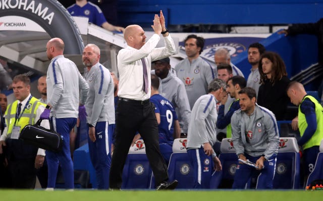 Burnley manager Sean Dyche applauds the fans