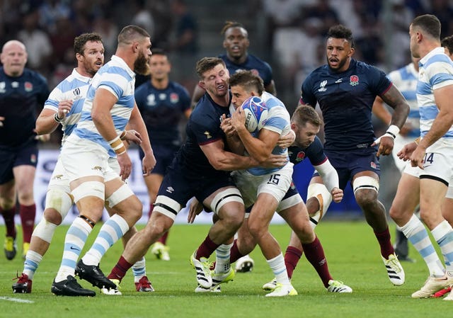 England’s Tom Curry, left, makes head on head contact with Argentina’s Juan Mallia which results in a red card