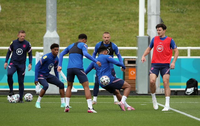 Harry Maguire (right) was among the England players who trained on Monday