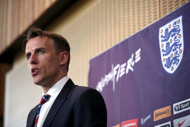England's first match after Neville's appointment was a 4-1 victory over France (Nick Potts/PA).