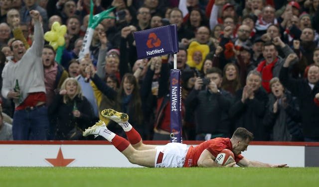 Wales’ Gareth Davies scores the opening try of the game during the NatWest 6 Nations victory over Scotland
