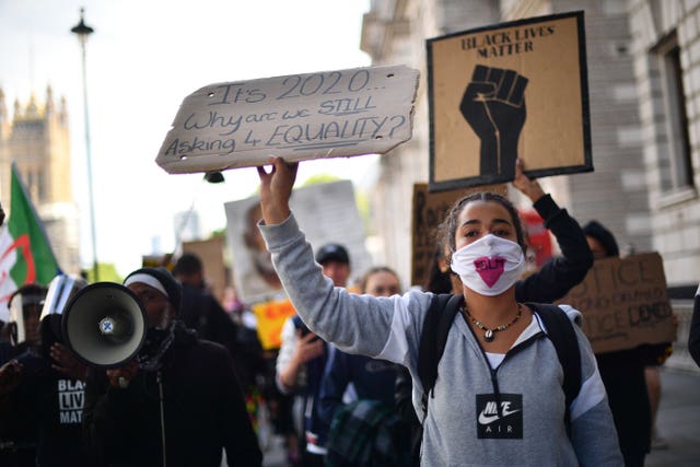 Black Lives Matter demonstrators walking to Downing Street