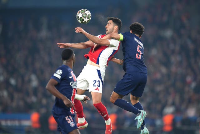Mikel Merino jumps to head the ball