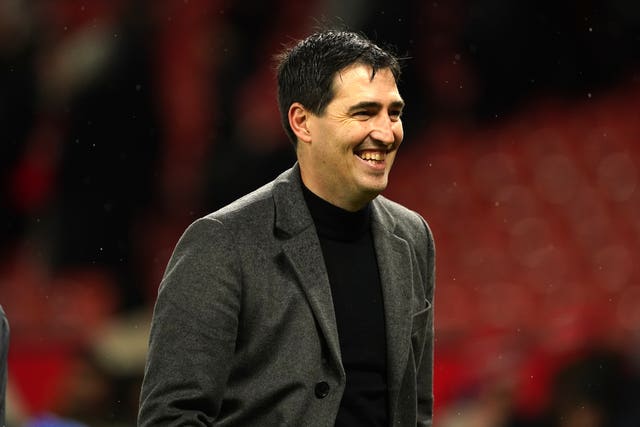 Bournemouth manager Andoni Iraola smiles