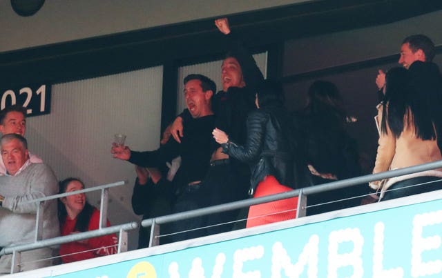 Salford City co-owners Gary Neville and Phil Neville celebrated at Wembley (PA)