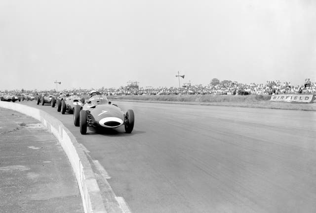 Sir Stirling Moss leads the field through Copse Corner at the start of the 1958 British Grand Prix. A two-time winner, Moss would be frustrated on this occasion by engine trouble