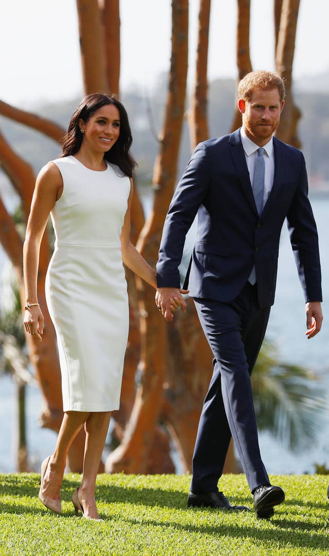 The Duchess of Sussex wore a white Karen Gee dress on day one of the royal tour
