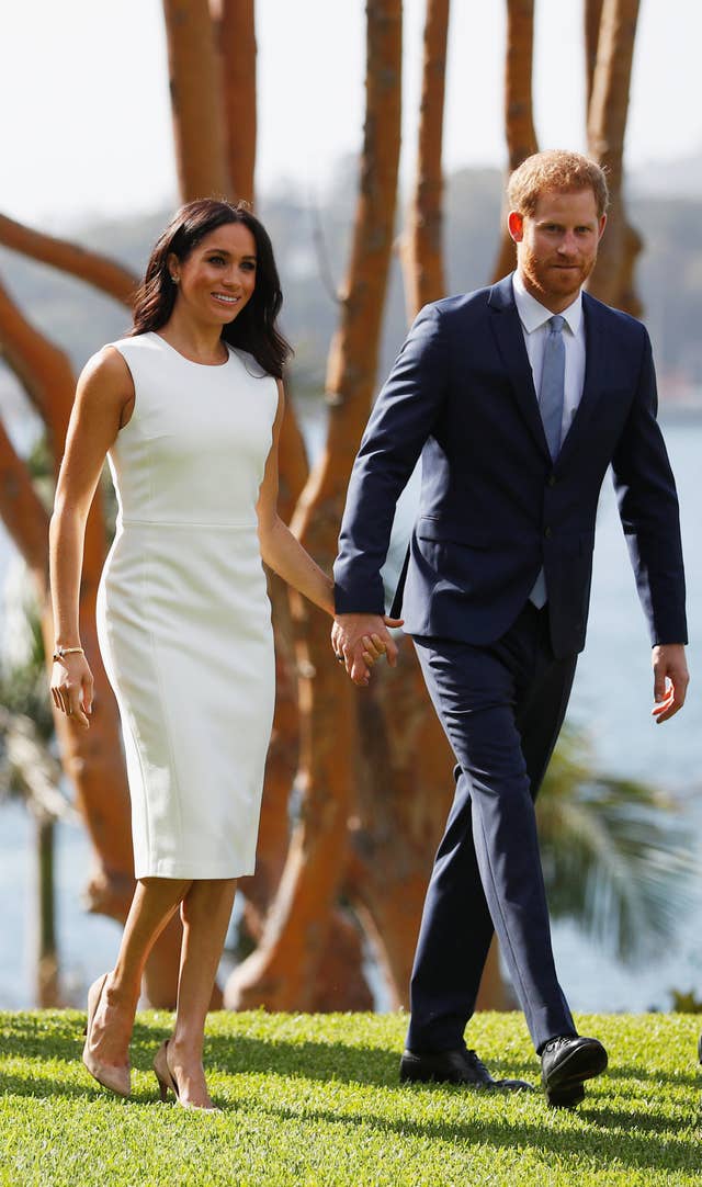 The Duchess of Sussex wore a white Karen Gee dress on day one of the royal tour