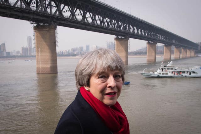 Prime Minister Theresa May looks out over the Yangtze River in the Chinese city of Wuhan during her China tour (Stefan Rousseau/PA)
