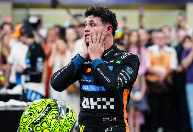 Norris reacts after becoming Britain's 11th F1 world champion