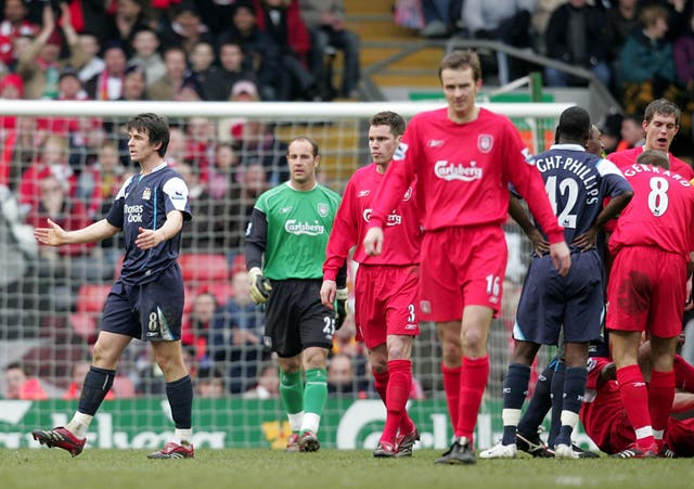 Joey Barton, left, leaves the field after being sent off for a foul on Sami Hyypia in a February 2006 encounter