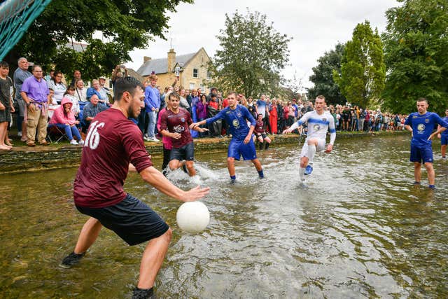 Annual Football in the River match